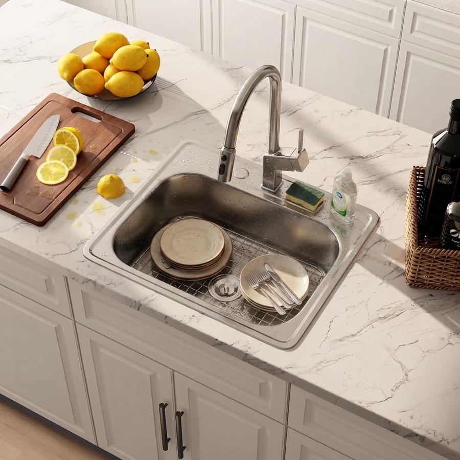Single-bowl drop-in sink in a compact kitchen run